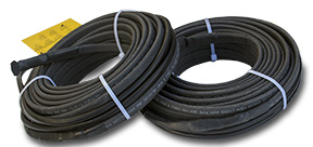 Self-regulating roof de-icing heat trace cable.